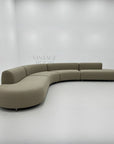 Moderne buet sofa i luksuriøst stof