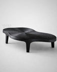 Design sofabord i organisk form i sort asketræ til stilfuld stue eller lounge