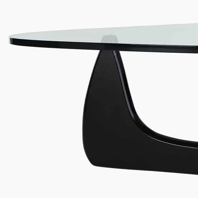 Design_sofabord_med_organisk_glas_og_sort_træbase