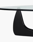 Design_sofabord_med_organisk_glas_og_sort_træbase