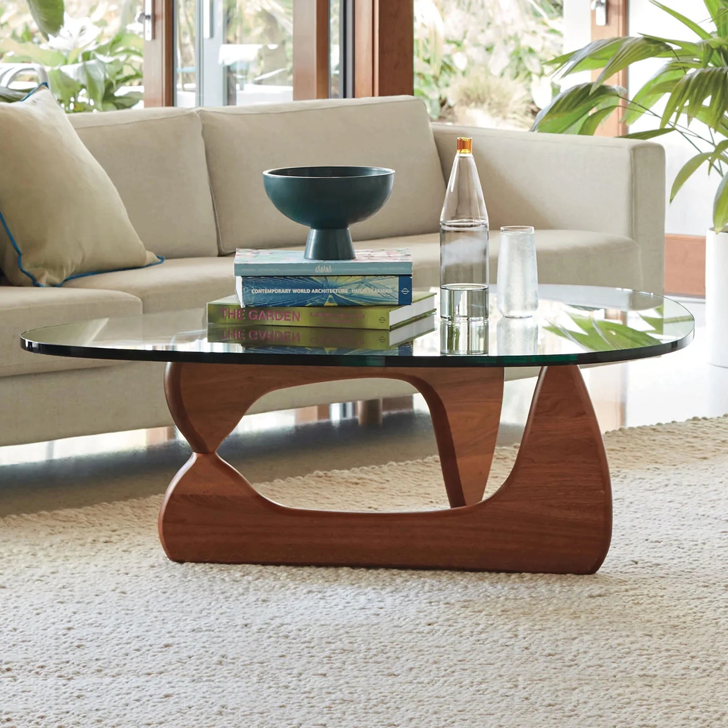 Glass_coffee_table_with_brown wooden_base