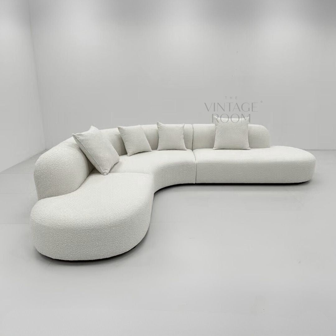 Modern curved sofa in luxury fabric