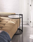Round_sidetable_with_glass_and_black_steel