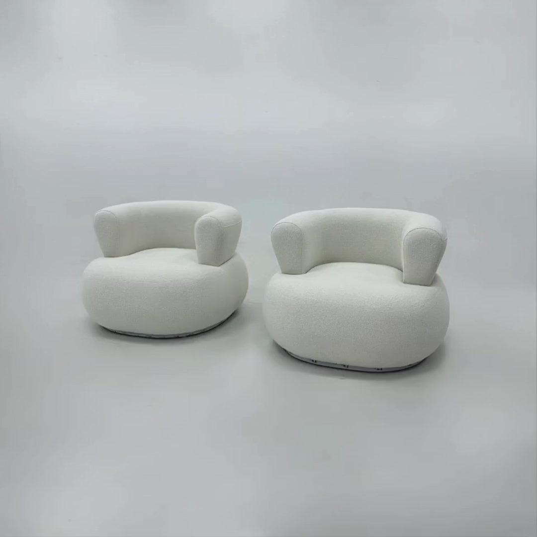 Elegant designer lounge chair in luxury fabric for living room or lounge