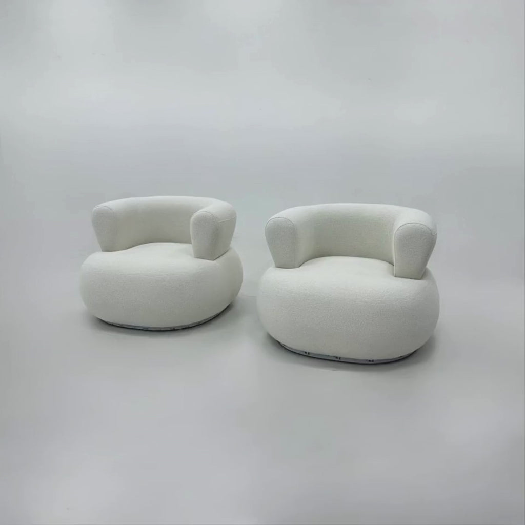 Elegant designer lounge chair in luxury fabric for living room or lounge